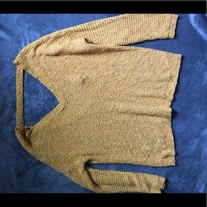 Bright yellow sweater (camera made it look off)